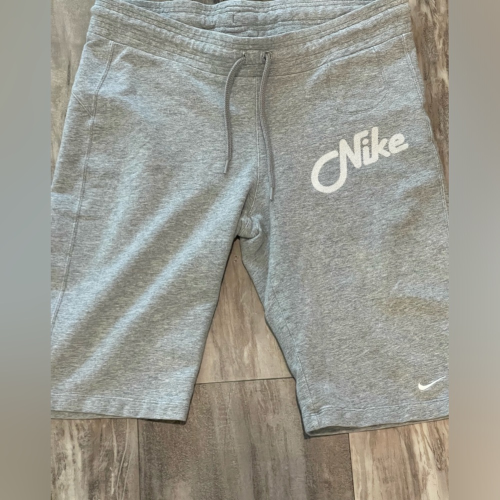 Nike Bermuda style shorts. Women size Small